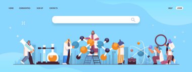 Arap bilim adamları, laboratuarda kimyasal deney yapan Arap moleküler yapı araştırmacılarıyla çalışıyorlar.