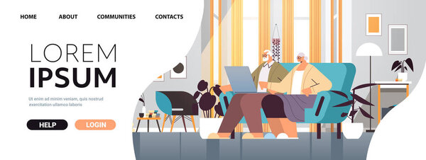 senior couple using laptop grandparents relaxing on sofa at home social media network online communication concept