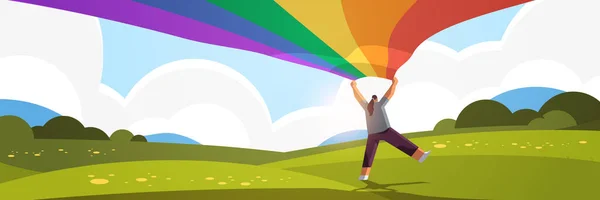 Mulher segurando lgbt arco-íris bandeira gay lésbicas amor desfile orgulho festival transexual amor conceito — Vetor de Stock