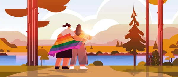 İki kız ellerinde Igbt gökkuşağı bayrağı, gay lezbiyen aşk festivali, travesti aşk konsepti taşıyor. — Stok Vektör