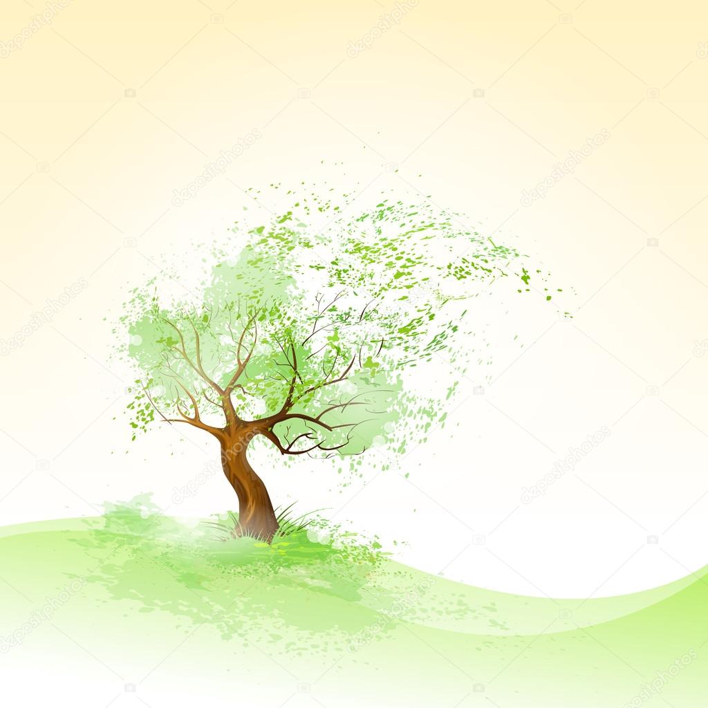 Green tree with leaves blowing on wind