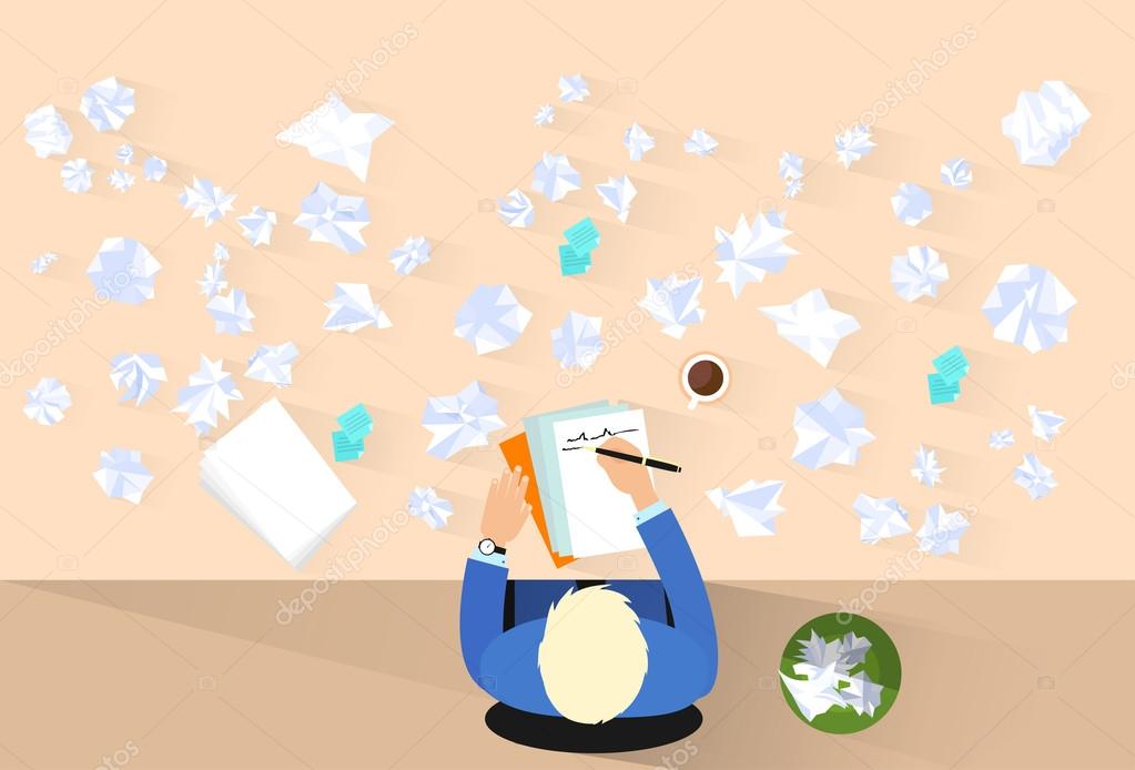 Businessman with pen and crumpled papers