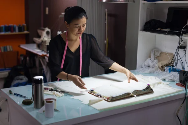 Asian female tailor