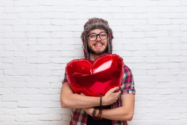 Man Hug Red Heart Shape Baloon Hipster Fashion Style Wearing Hat Glasses — Stock Photo, Image