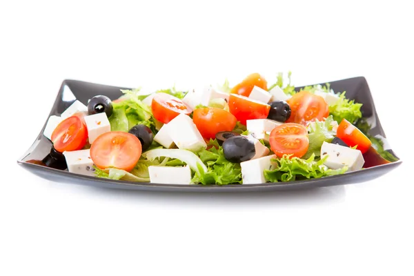 Griekse salade geïsoleerd — Stockfoto