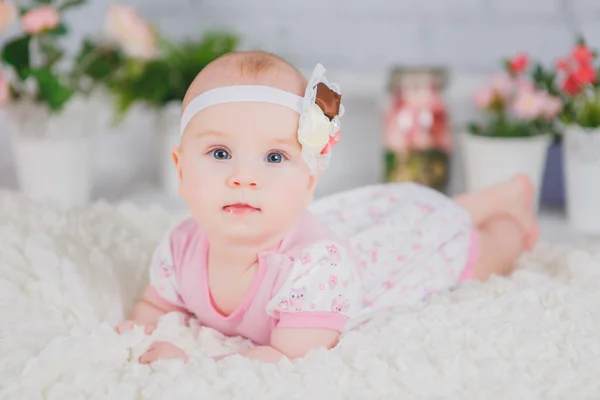 Baby girl with bow — Stock Photo, Image