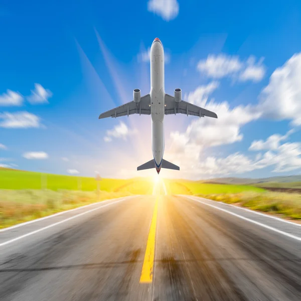 Airplane and highroad — Stock Photo, Image