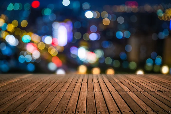 Blurred city lights and office buildings — Stock Photo, Image