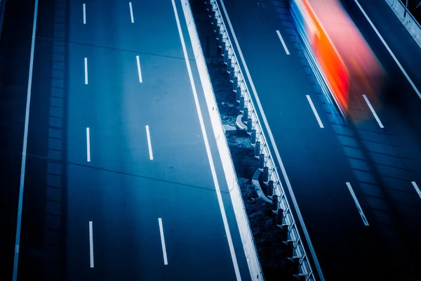 Motion trucks on the freeway — Stock Photo, Image