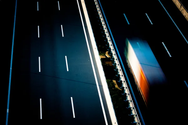 Motion trucks on the freeway — Stock Photo, Image