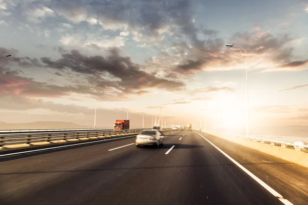 Highway in sunset — Stock Photo, Image