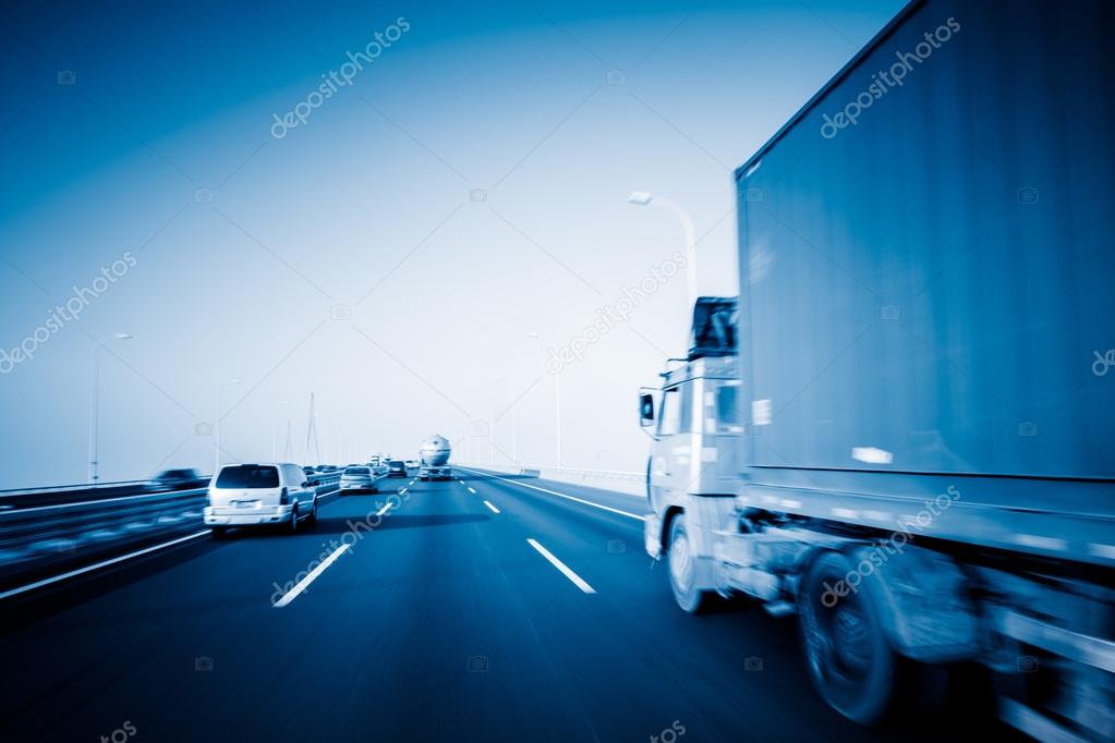 motion trucks on the freeway