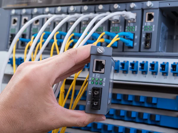 Man Working Network Server Room Fiber Optic Hub Digital Communications — Stock Photo, Image