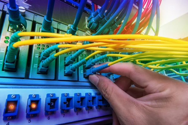 Man Working Network Server Room Fiber Optic Hub Digital Communications — Stock Photo, Image