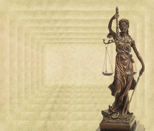 Statue of justice on old paper background, law concept — Stock Photo, Image