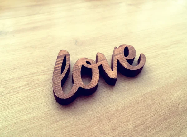 Drewniane Litery Tworzące Słowo Love Napisane Drewnianym Tle — Zdjęcie stockowe