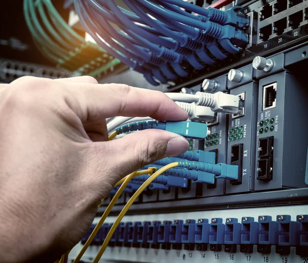 Engineer Connecting Network Cable Switch — Stock Photo, Image