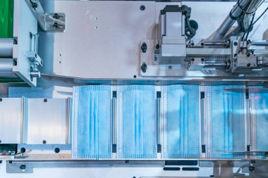 Nanofiberli tıbbi maskeler üretmek için otomatik makine. Coronavirus ve Covid-19 Koruma