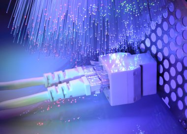 network cables and hub closeup with fiber optical background clipart