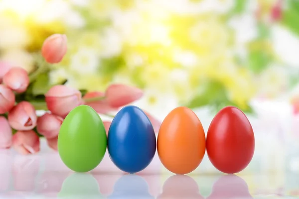 Decorated eggs and spring flowers — Stock Photo, Image