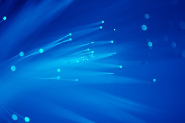 Optik fiber dinamik teknoloji arka planının derinliklerinden uçuyor.