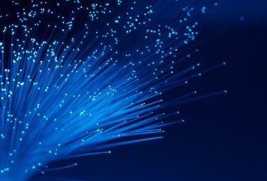 Optik fiber dinamik teknoloji arka planının derinliklerinden uçuyor.