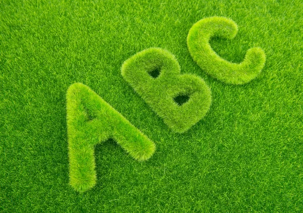 Alphabet letters ABC made from grass with grass background — Stock Photo, Image
