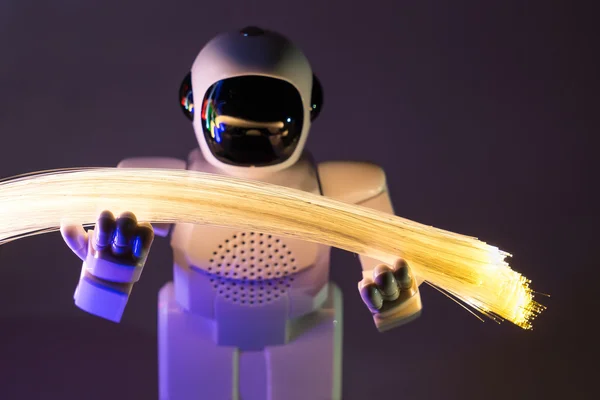 Robot drží vlákno optický kabel — Stock fotografie