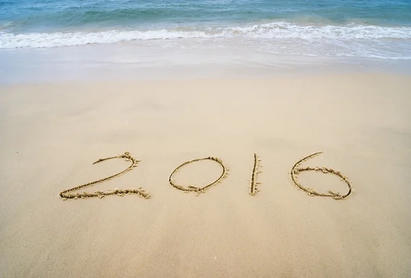 2016 written in sand, on tropical beach — Stock Photo, Image
