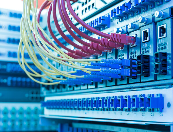 Fiber Optic cables connected to an optic ports