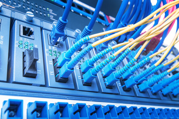 Fiber Optic cables connected to an optic ports