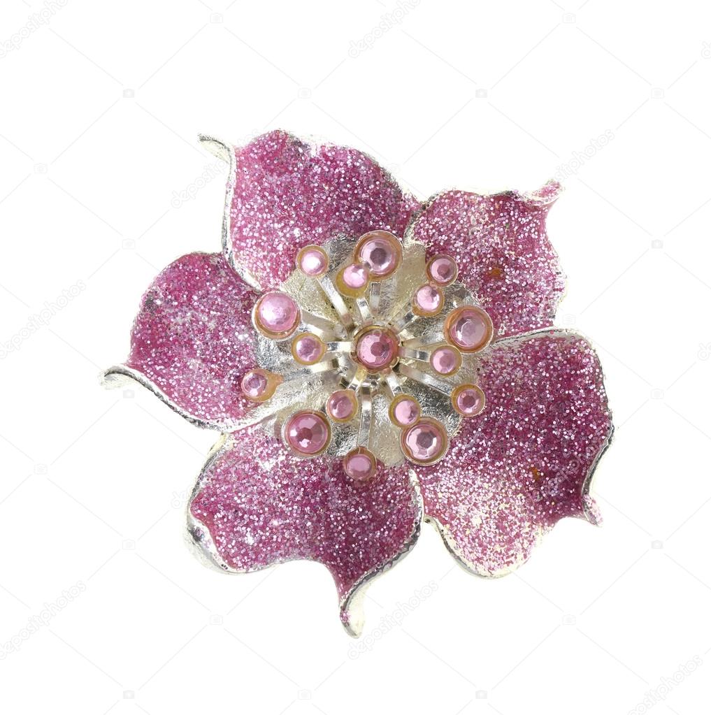 flower brooches on white background