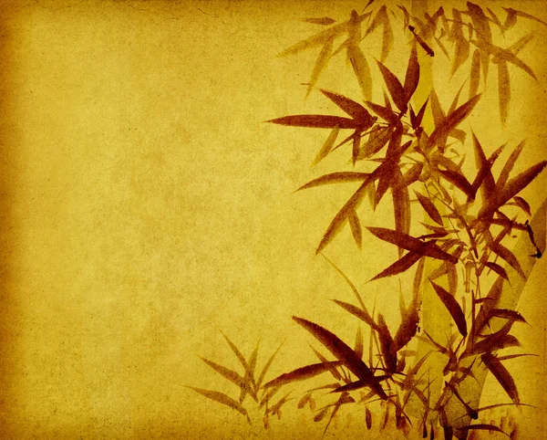 Бамбук на старом фоне текстуры гранж-бумаги — стоковое фото