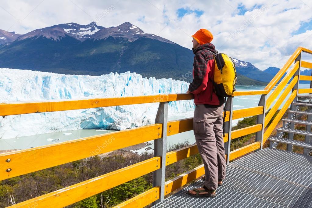 Man looking on Perito Moreno glacier
