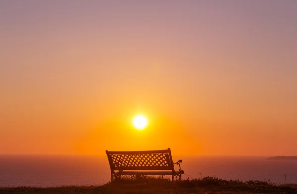 Bench on sea shore — Stock Photo, Image