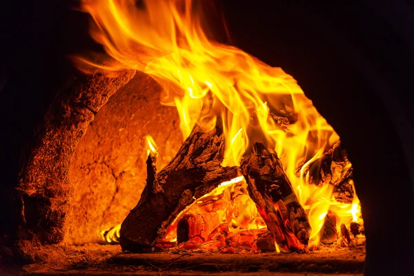 Wood stove with fire — Stock Photo, Image