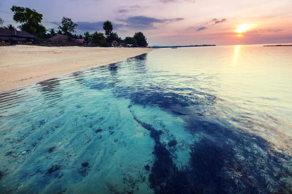 Sunset at the sea coast — Stock Photo, Image