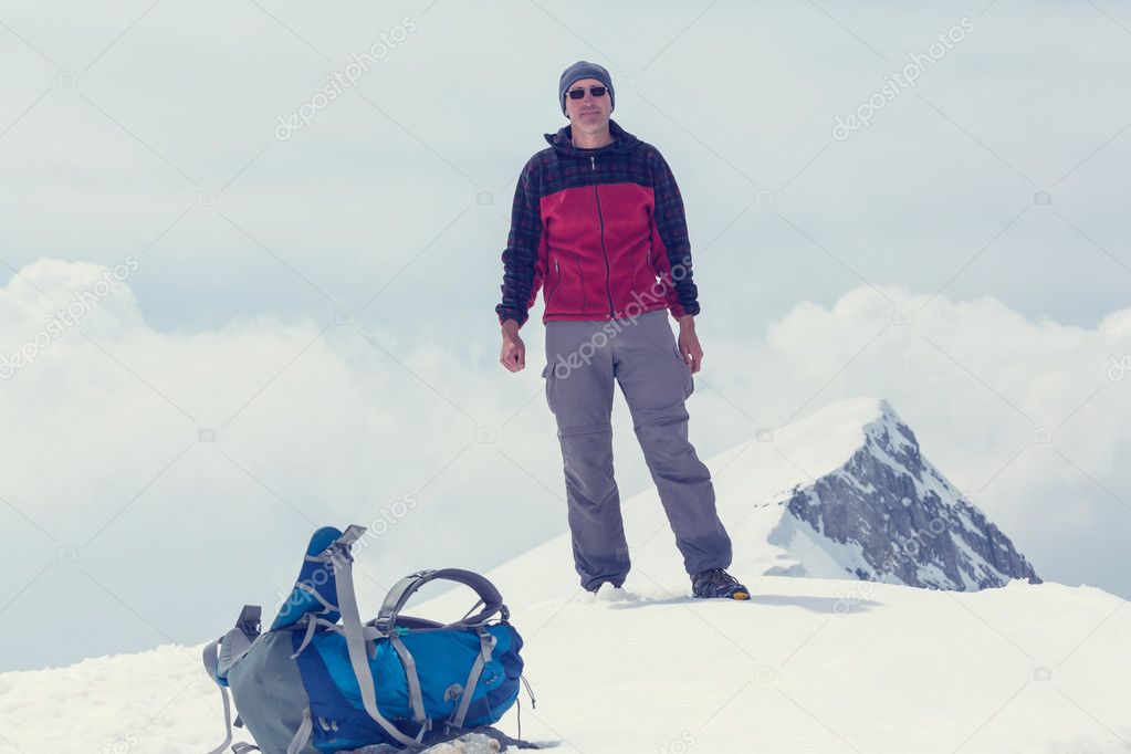 Hiker standing on peak