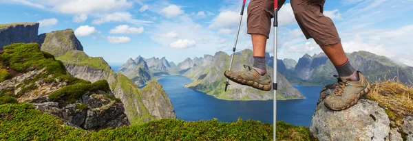 Hiker's legs in Lofoten landscape — Stock Photo, Image