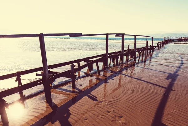 Wooden boardwalk on the beach — Stock Photo, Image