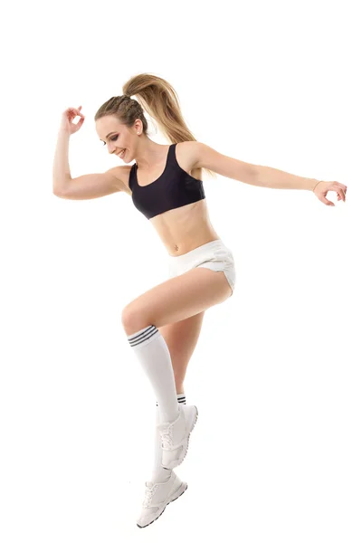 Mutlu güzel kadın fitness eğitmeni olarak izole beyaz çalışma