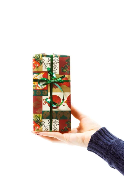 Hand with christmas gift — Stock Photo, Image