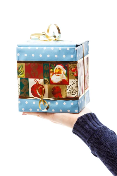 Hand with christmas gift — Stock Photo, Image