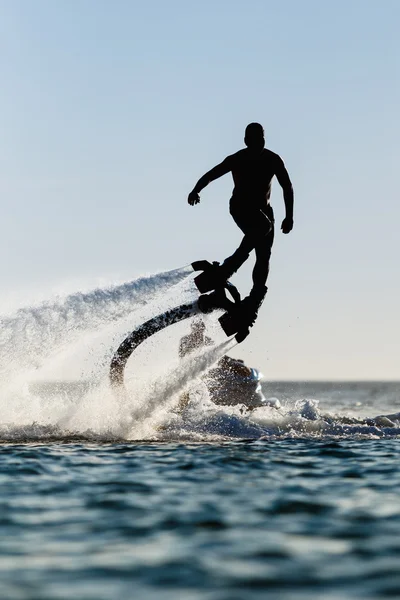 Silhouette di un pilota di fly board — Foto Stock