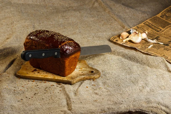 Zdrowa żywność: pokrojony chleb brązowy — Zdjęcie stockowe
