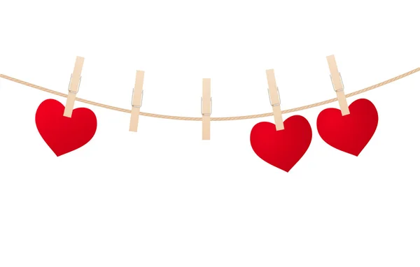 Red hearts with clothespins — Stock Vector