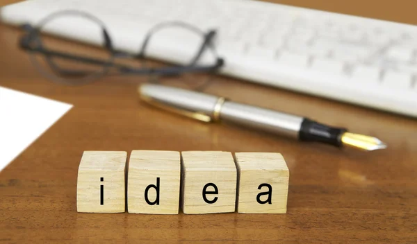 La palabra idea en el sello de madera — Foto de Stock