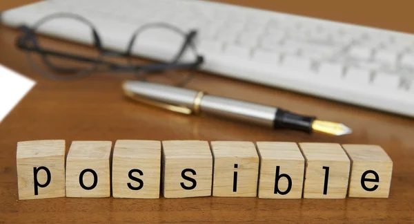 The word possible on wood stamp — Stock Photo, Image