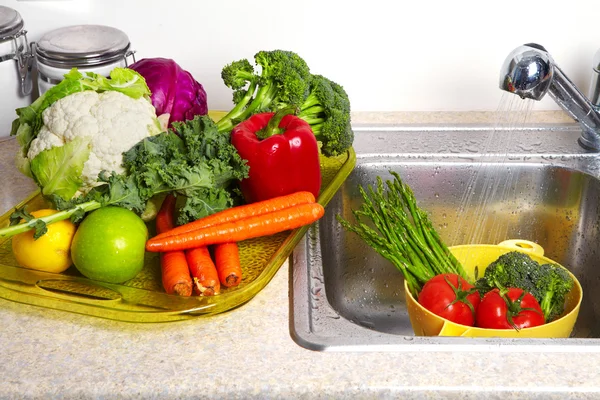 Vegetables and fruit in the sink — Stock Photo, Image