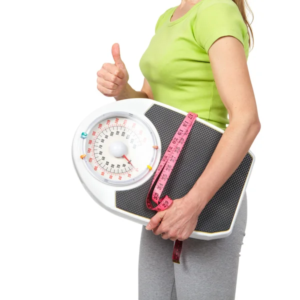 Woman with scales — Stock Photo, Image